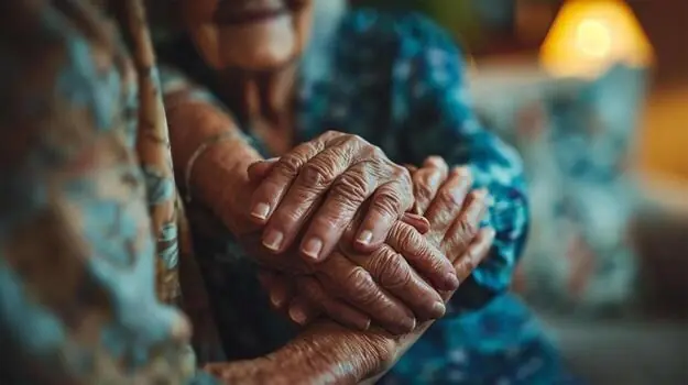 A hand held so an elder does not feel left behind
