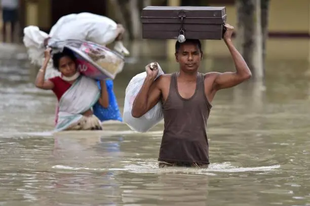 He lifted the last box of home above the water